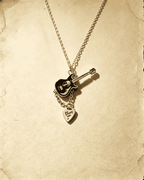 Vintage Guitar‑Shaped Pendant Necklace With Heart Charm