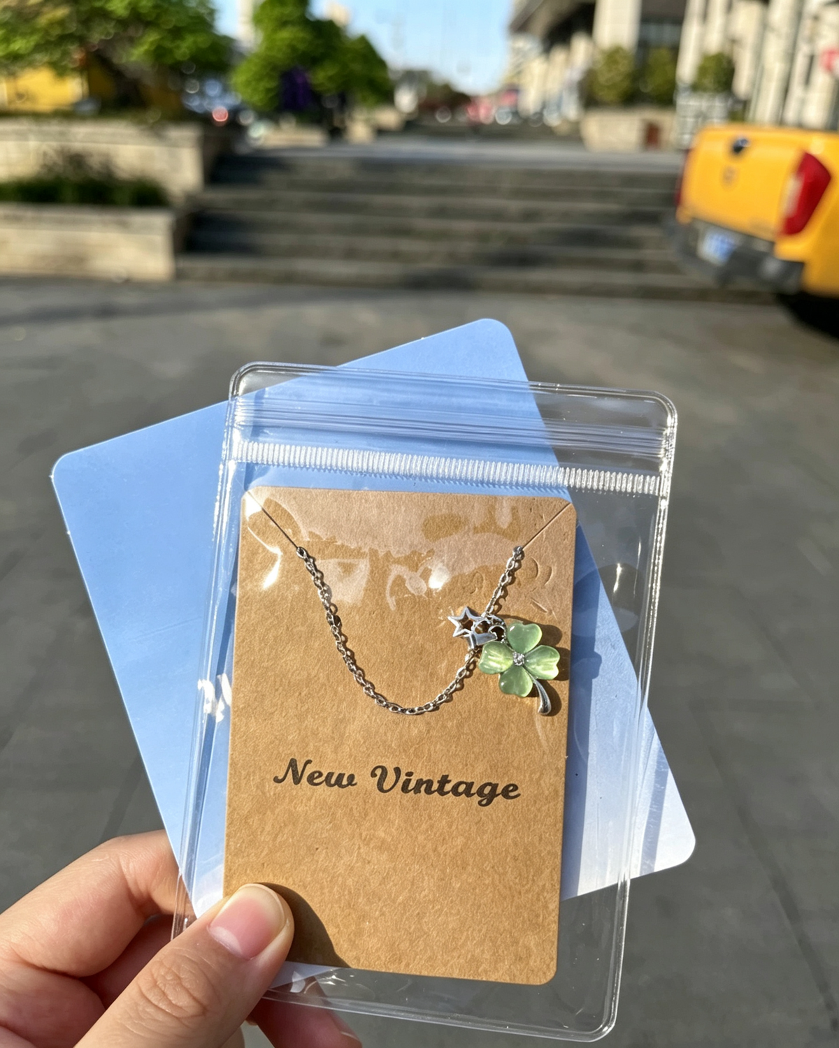 Packaged in green wrapping Four‑Leaf Clover Necklace
