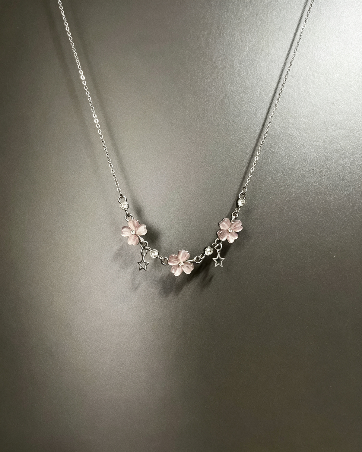 Vintage Lucky Four‑Leaf Silver-plated necklace featuring three four-leaf clovers and stars