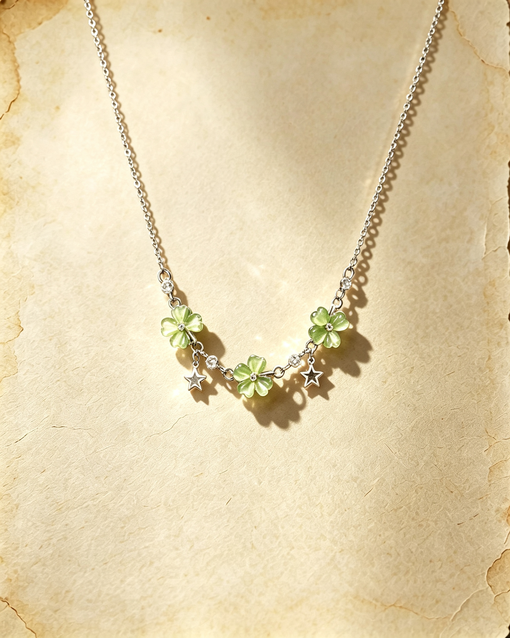 Vintage Lucky Four‑Leaf Silver-plated necklace featuring three four-leaf clovers and stars