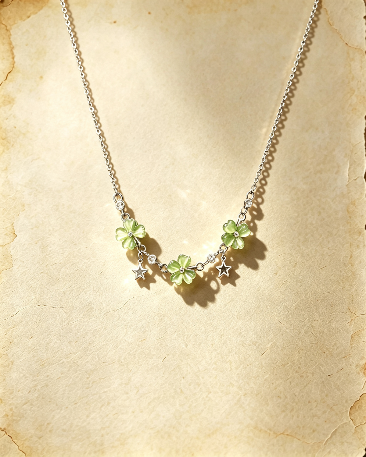 Vintage Lucky Four‑Leaf Silver-plated necklace featuring three four-leaf clovers and stars