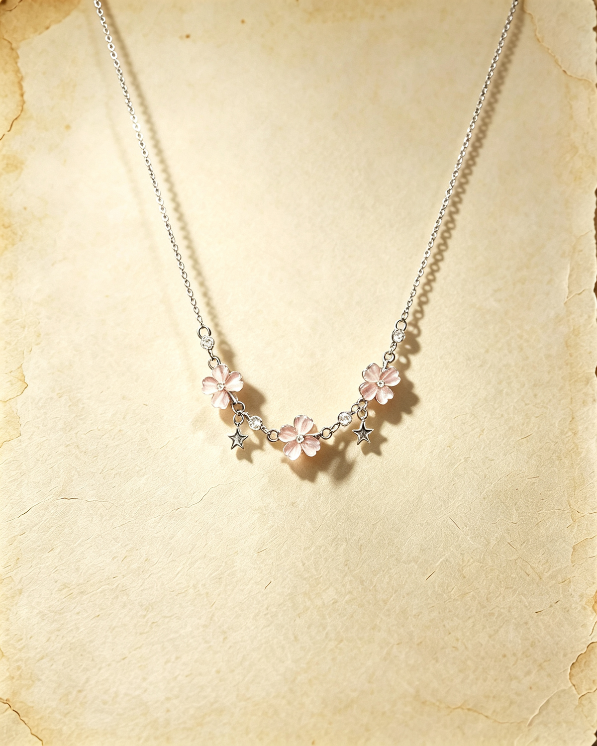 Pink Vintage Lucky Four‑Leaf Silver-plated necklace featuring three four-leaf clovers and stars