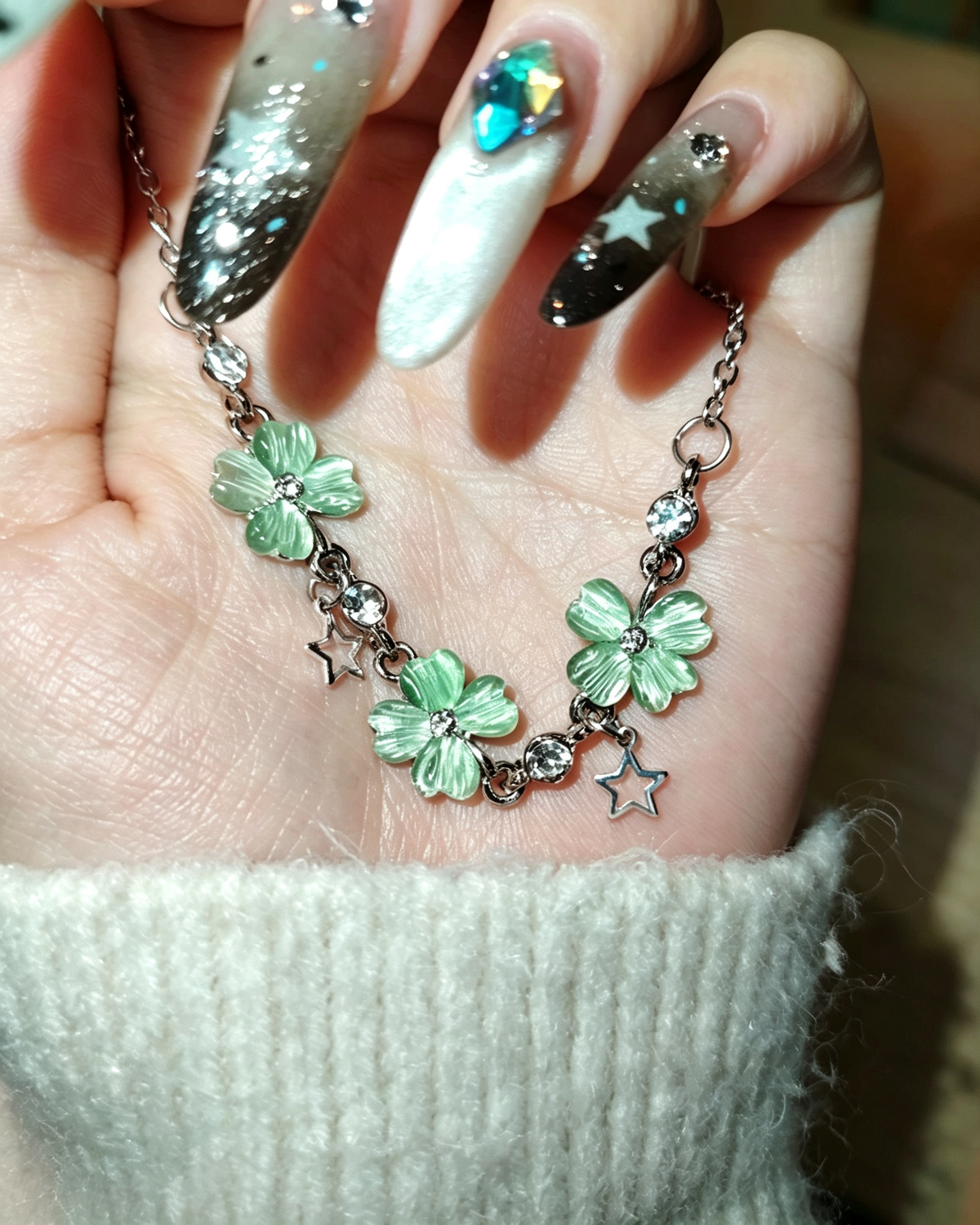 Vintage Lucky Four‑Leaf Silver-plated necklace featuring three four-leaf clovers and stars